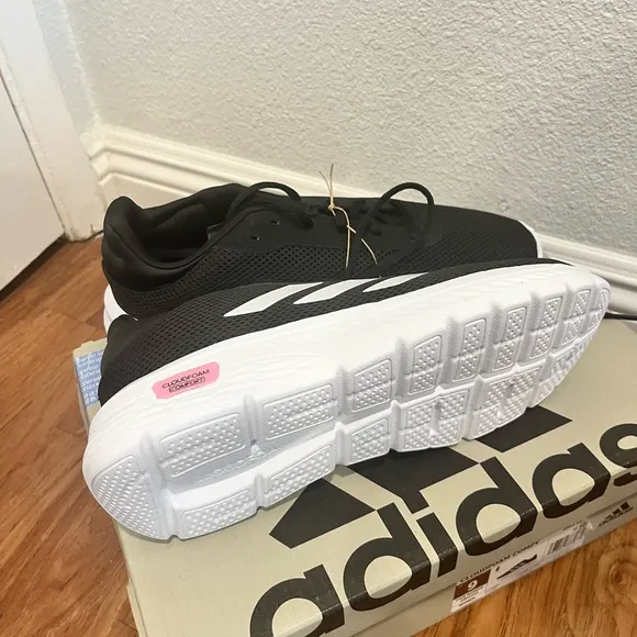 Adidas Black and White Athletic Sneakers with Signature Stripes