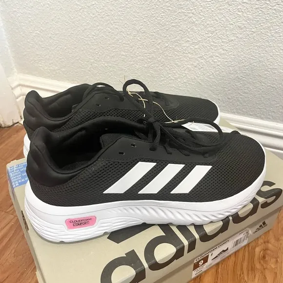 Adidas Black and White Athletic Sneakers with Signature Stripes