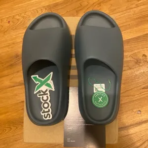 Adidas Gray Slippers with Open Back Design