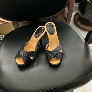 Bebe Sexy mules kitten heel black cork