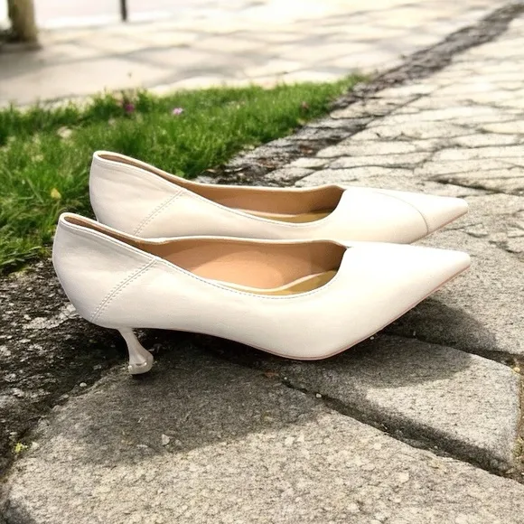 C. Paravano Women’s Kitten Cream Heel Pumps