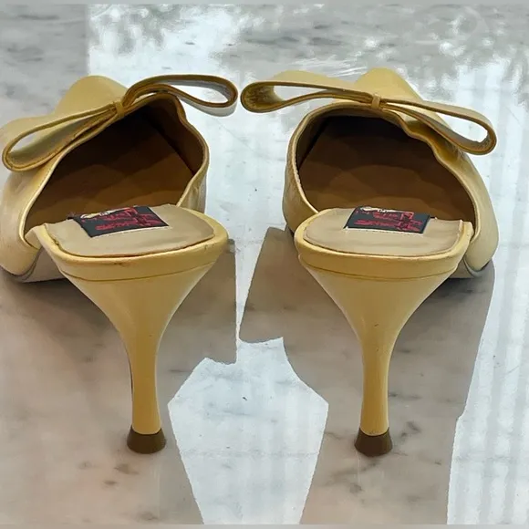 Carlos Falchi leather stiletto mules with bows in butter yellow, 7B, EUC