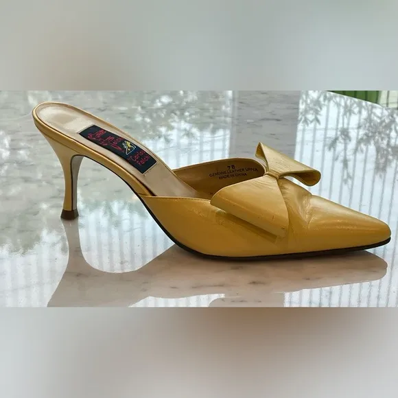 Carlos Falchi leather stiletto mules with bows in butter yellow, 7B, EUC