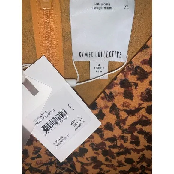C/Meo Collective Apparent Long Sleeve Dress With An All Over Abstract Animal Pri