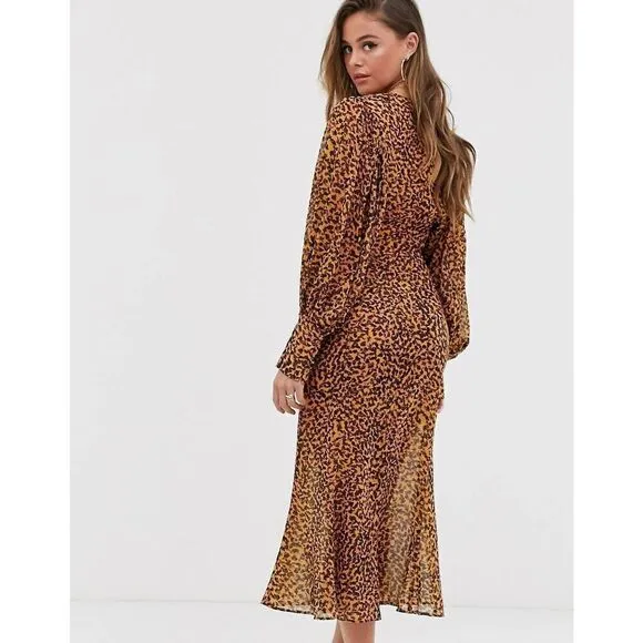 C/Meo Collective Apparent Long Sleeve Dress With An All Over Abstract Animal Pri