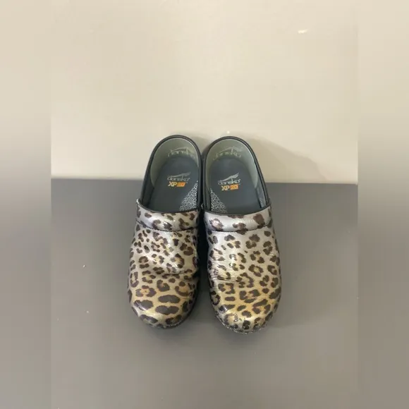 Dansko leopard cheetah print clogs size 38(7.5-8us)metallic black gold and brown