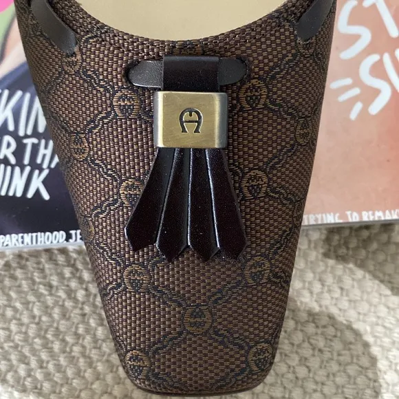 “Etienne Aigner” brown logo kitten heels; size 8