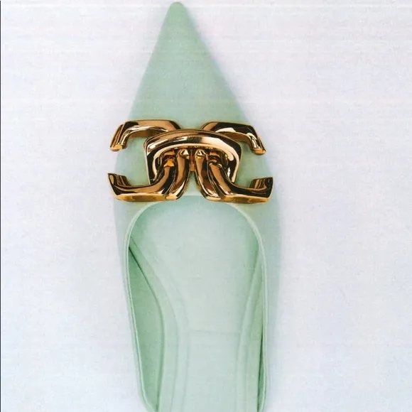 FLAT MULES WITH BUCKLE DETAIL