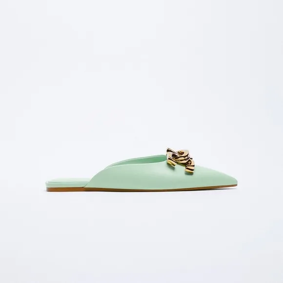 FLAT MULES WITH BUCKLE DETAIL