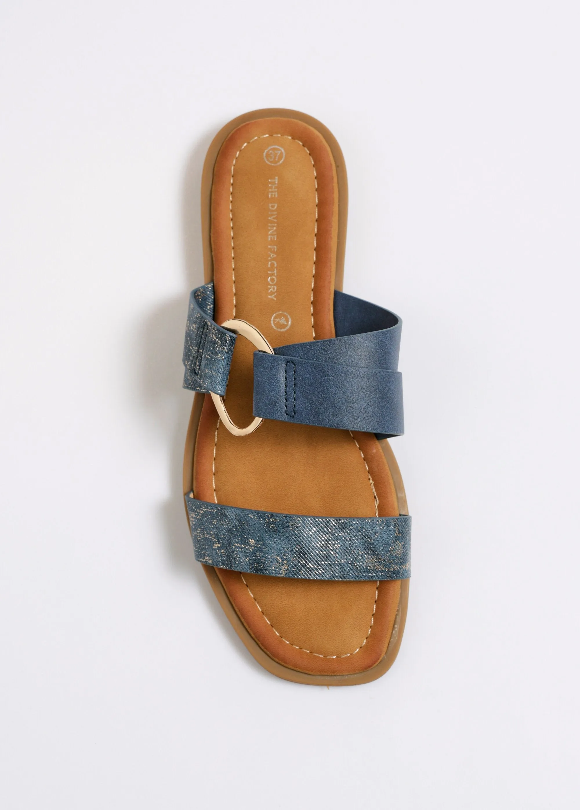 Flat mules with metallic straps