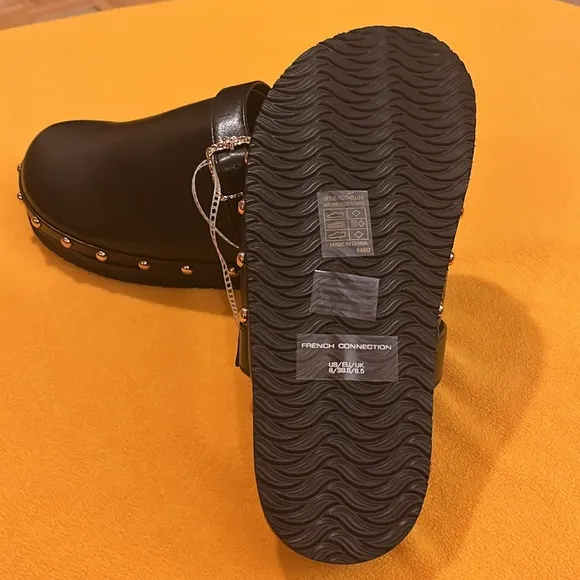 French Connection Chello Buckle Clogs. Black with gold accents. Size 8. NWT