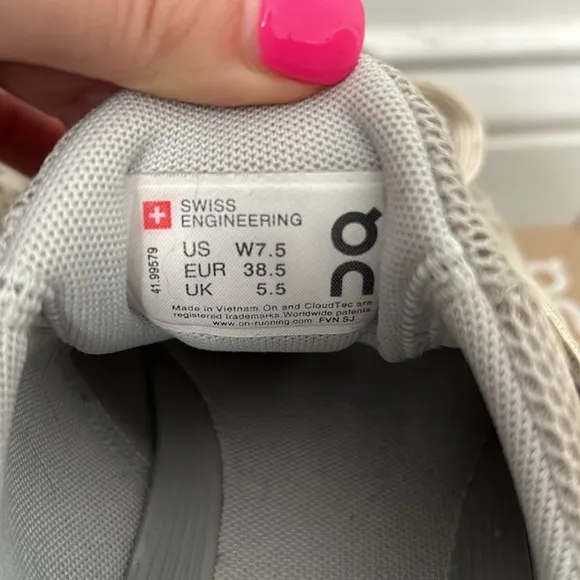 Gray and white On running shoes.
