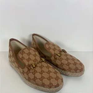 Gucci Tan Gold Slip-On Loafers with Monogram Pattern