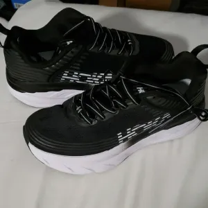 Hoka Black and White Athletic Shoes Performance Design Bondi 6