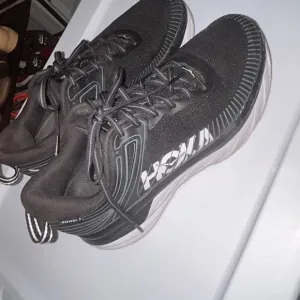 Hoka Black and White Athletic Shoes with Mesh Upper