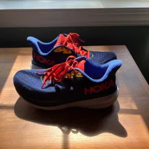 Hoka Blue and Red Athletic Shoes with Cushioned Support