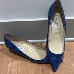 Jimmy Choo Blue Heels with Elegant Pointed Toe and Dazzling Texture