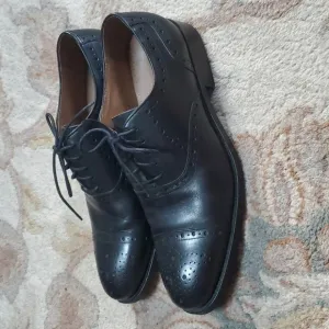 Johnston and Murphy black wingtip oxfords