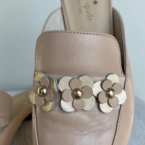 Kate Spade “Carilee” leather mules with flower detail