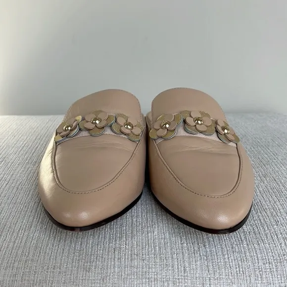 Kate Spade “Carilee” leather mules with flower detail