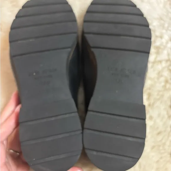 Kate Spade Kolby Black and Gold Loafers with Elegant Metal Accent