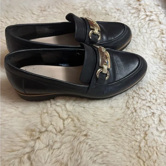 Kate Spade Kolby Black and Gold Loafers with Elegant Metal Accent
