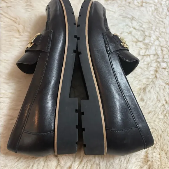 Kate Spade Kolby Black and Gold Loafers with Elegant Metal Accent