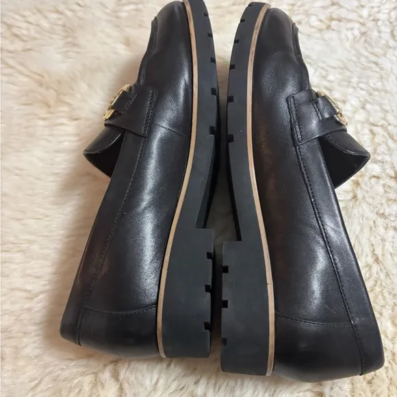 Kate Spade Kolby Black and Gold Loafers with Elegant Metal Accent
