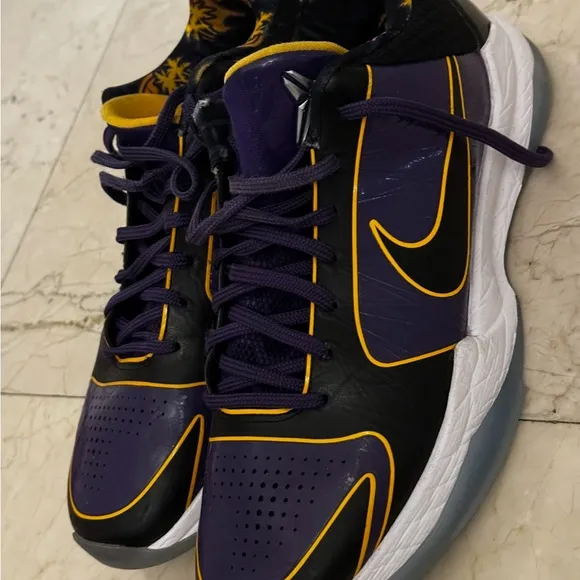 KOBE PURPLE Nike Black and Purple Athletic Shoes with Gold Accents