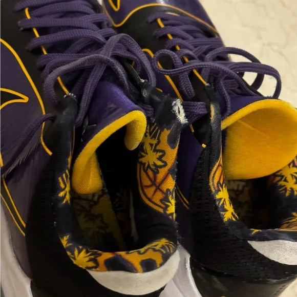 KOBE PURPLE Nike Black and Purple Athletic Shoes with Gold Accents