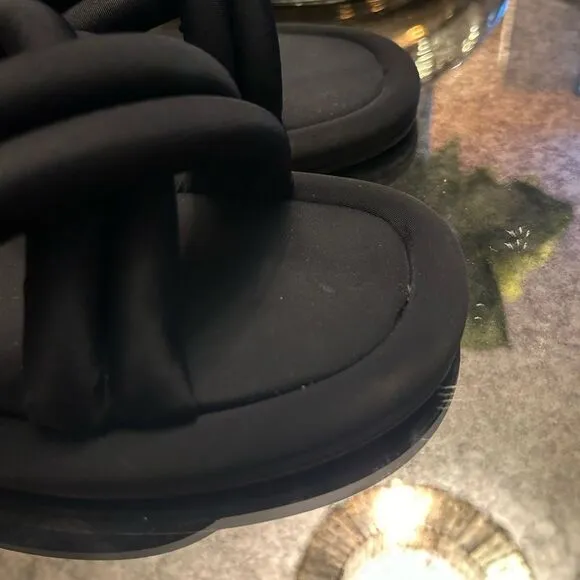 Larroudé Cali flat mules in black Lycra
