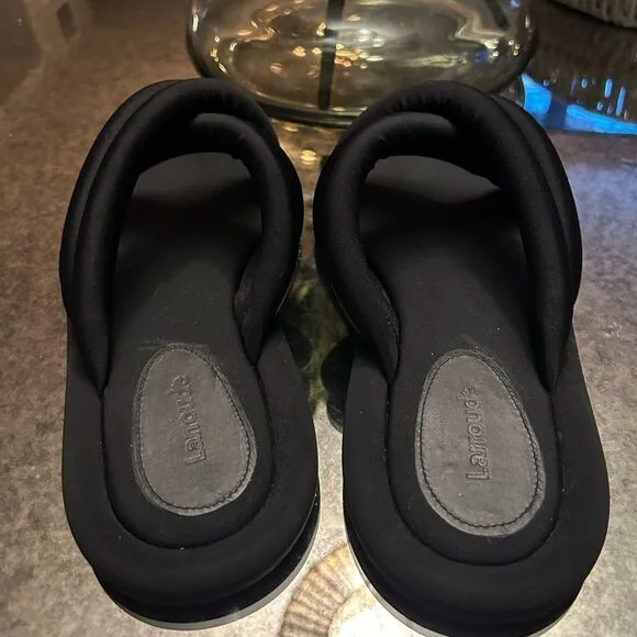 Larroudé Cali flat mules in black Lycra