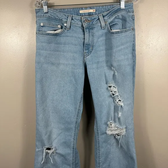 LEVI’S WOMEN’S SUPERLOW BOOTCUT DISTRESSED JEANS LIGHT INDIGO SIZE 30x30