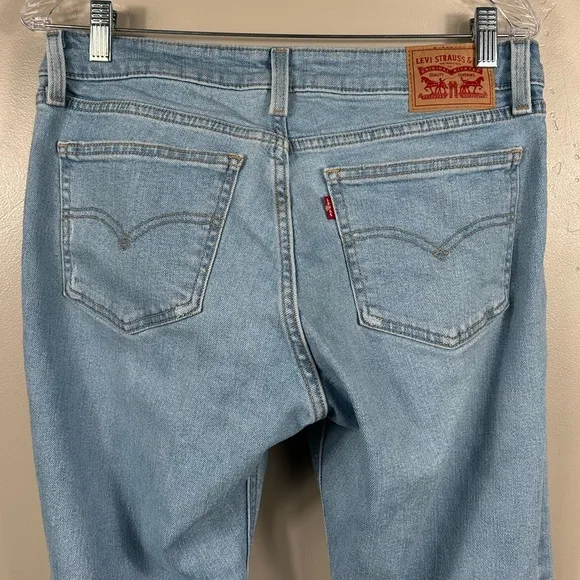 LEVI’S WOMEN’S SUPERLOW BOOTCUT DISTRESSED JEANS LIGHT INDIGO SIZE 30x30