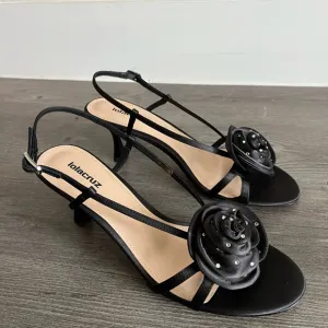Lola Cruz Black  Kitten Heel Sandals with Floral Embellishment