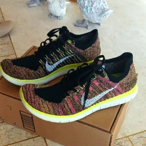 MENS,Nike Multicolor Flyknit Running Shoes,,size 9, exellent condition