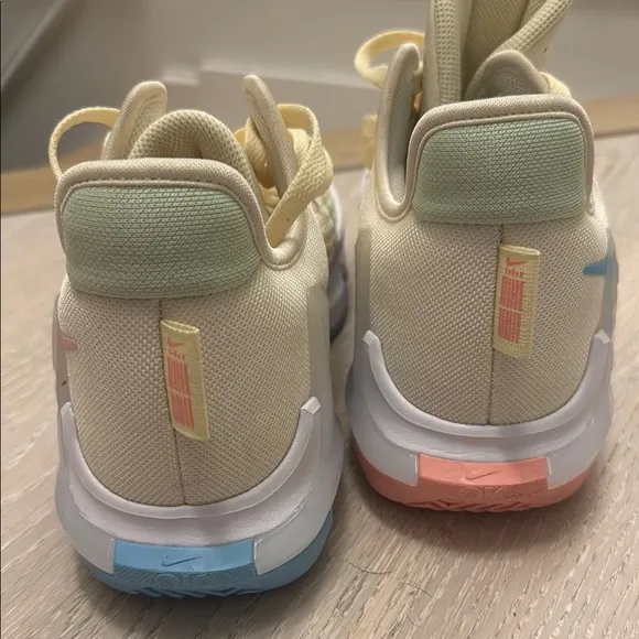 Nike Cream and Green Athletic Shoes with Modern Design