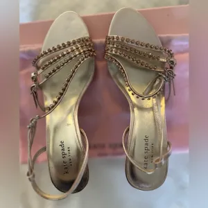 NWT- Kate Spade Rose Gold Leather Heels size 7.5 M. Kitten 3” heel