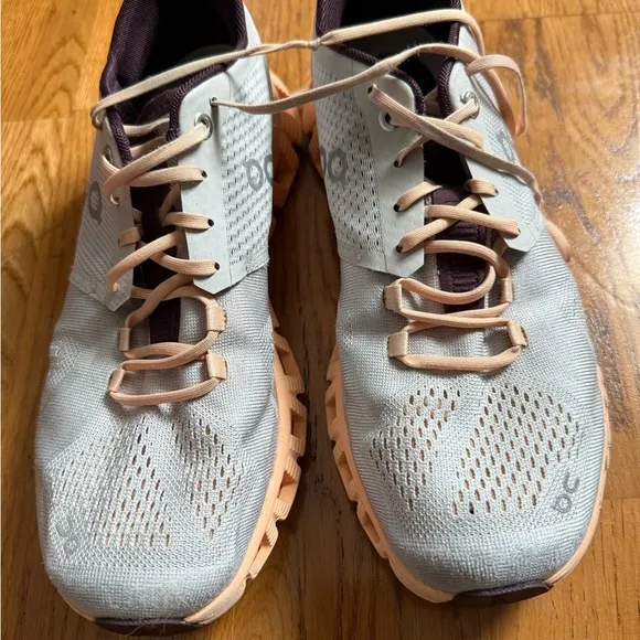 On Cloud Running Athletic Shoes White and Orange Streamlined Design