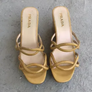 Prada Patent leather wedge mules