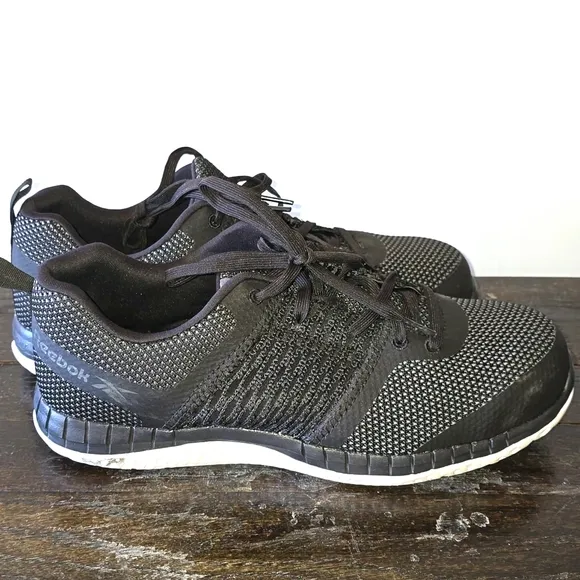 Reebok work composite, toe, slip resistant oil resistant. Men's size 11 wide