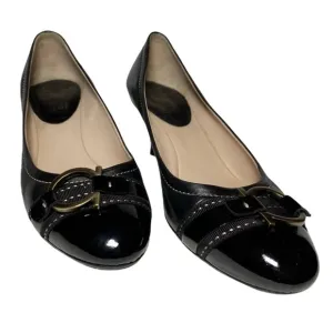 Salvatore Ferragamo black leather pumps