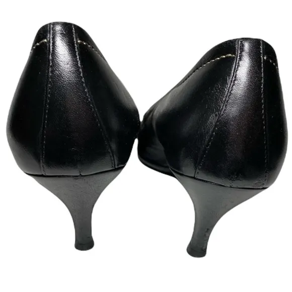 Salvatore Ferragamo black leather pumps