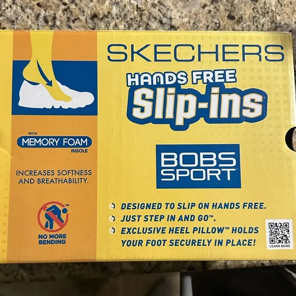 SKECHERS Bobs Sport Slip Ins in black and leopard heel accent