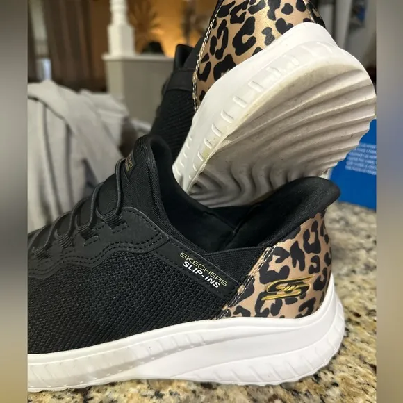 SKECHERS Bobs Sport Slip Ins in black and leopard heel accent