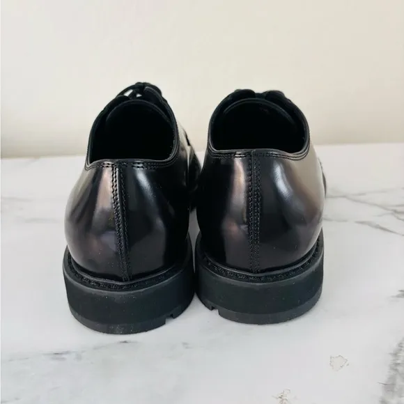 TODS Gommini leather derby shoes