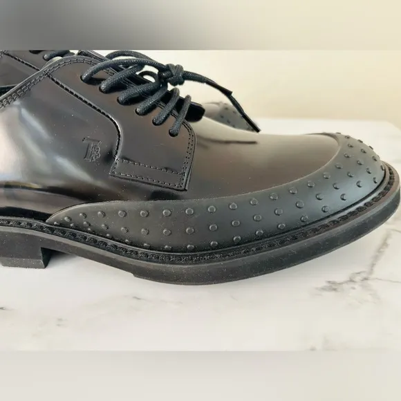 TODS Gommini leather derby shoes