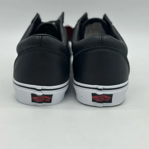 Vans Black and White Sneakers with Edgy Design