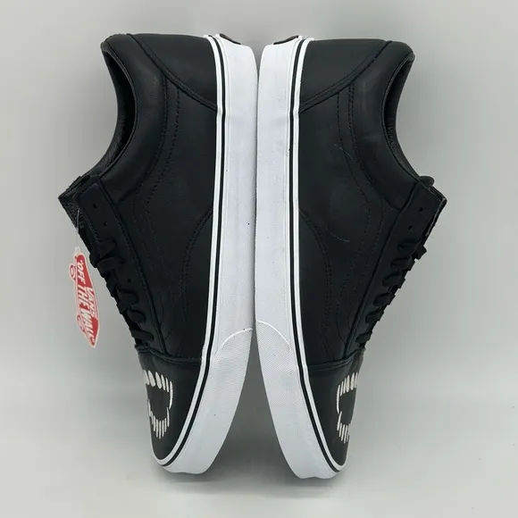 Vans Black and White Sneakers with Edgy Design