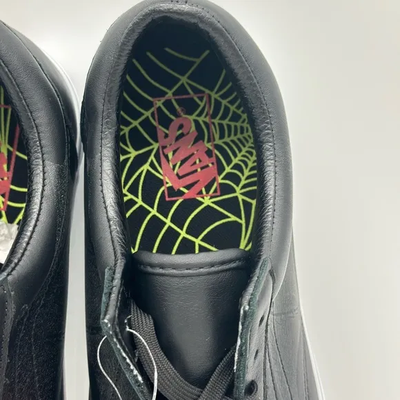 Vans Black and White Sneakers with Edgy Design